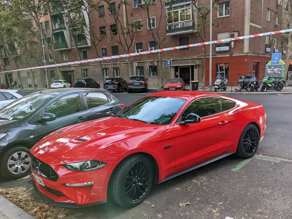 A red pony car in Madrid! #fordmustang 